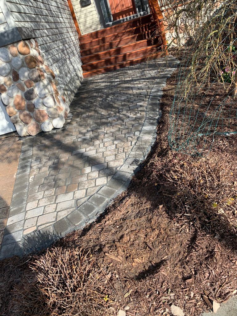 Tuscany Calgary Front yard landscaping pathway paving stones repair 5