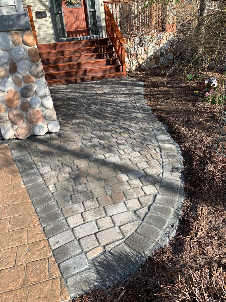 Tuscany Calgary Front yard landscaping pathway paving stones repair 6