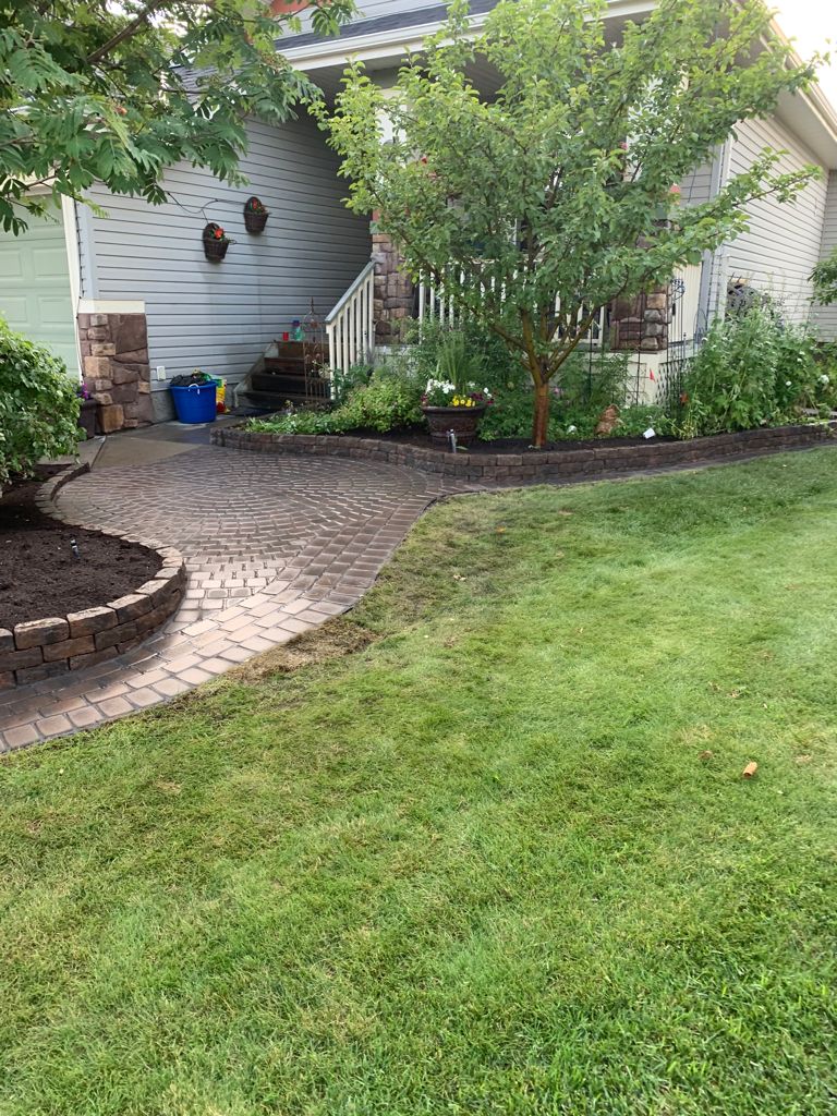 Valley-Ridge-Calgary-garden-front-yard-stone-flowerbeds-cobble-stone-