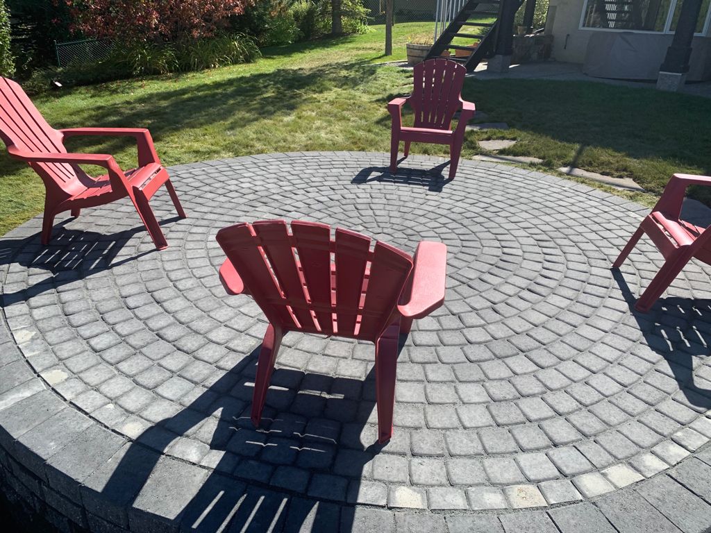 charcoal charcoal grey patio circle fire pit backyard landscaping ideas calgary