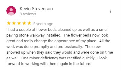 Paving stone walkway with flowerbed renovations A Green Future review