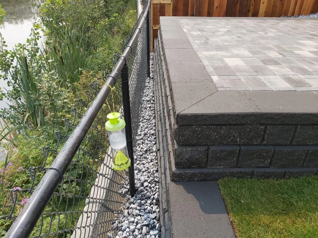 Rocky Ridge NW Calgary New home Landscaping Patio Retaining wall photo 5