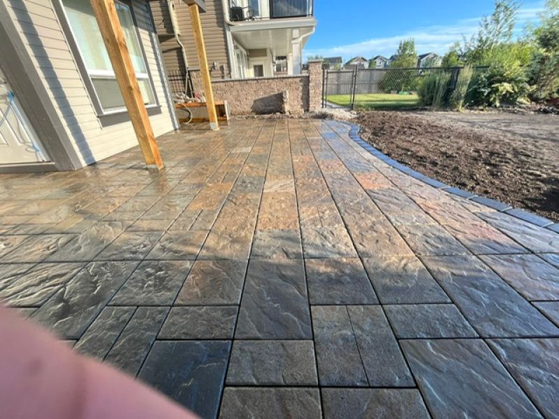 Airdrie-permeable-paving-patio-french-drains-landscaping-