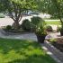 Valley-Ridge-Calgary-front-yard-stone-flowerbeds-cobble-stone-