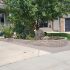 Valley-Ridge-Calgary-front-yard-stone-flowerbeds-cobble-stone-