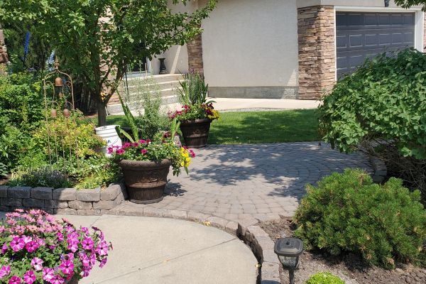 Valley-Ridge-Calgary-front-yard-stone-flowerbeds-cobble-stone-