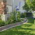 Valley-Ridge-Calgary-front-yard-stone-flowerbeds-cobble-stone-