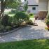 Valley-Ridge-Calgary-front-yard-stone-flowerbeds-cobble-stone-