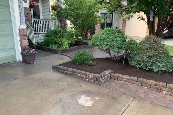 Valley-Ridge-Calgary-garden-front-yard-stone-flowerbeds-cobble-stone-