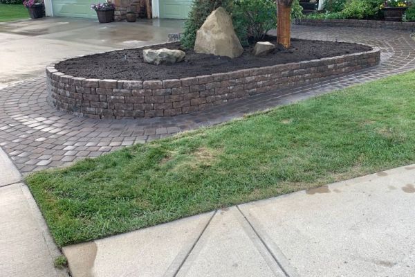 Valley-Ridge-Calgary-garden-front-yard-stone-flowerbeds-cobble-stone-