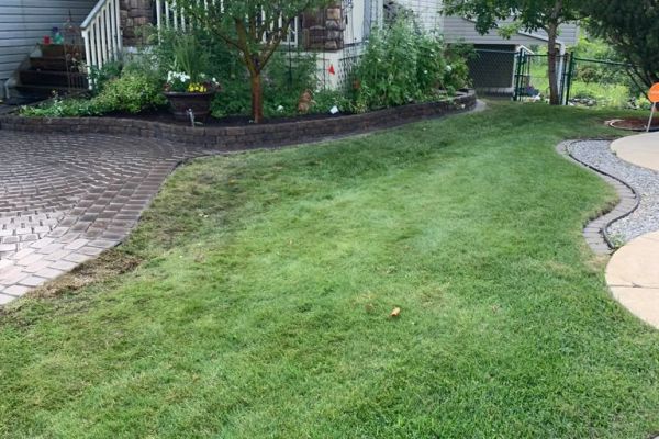 Valley-Ridge-Calgary-garden-front-yard-stone-flowerbeds-cobble-stone-