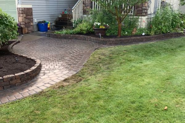 Valley-Ridge-Calgary-garden-front-yard-stone-flowerbeds-cobble-stone-