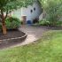 Valley-Ridge-Calgary-garden-front-yard-stone-flowerbeds-cobble-stone-