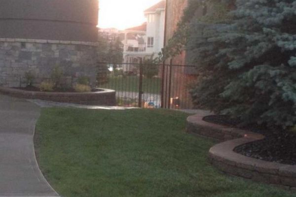 grass landscape design flower bed blocks calgary